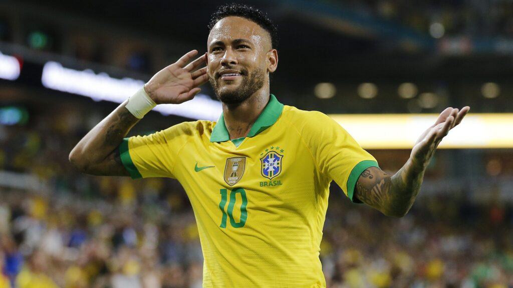 Neymar reage após assistência para Casemiro, em gol contra a Colômbia, durante o 1º tempo do amistoso realizado no Hard Rock Stadium, na Flórida. Camisa 10 do Brasil veste uniforme amarelo da Seleção Brasileira.