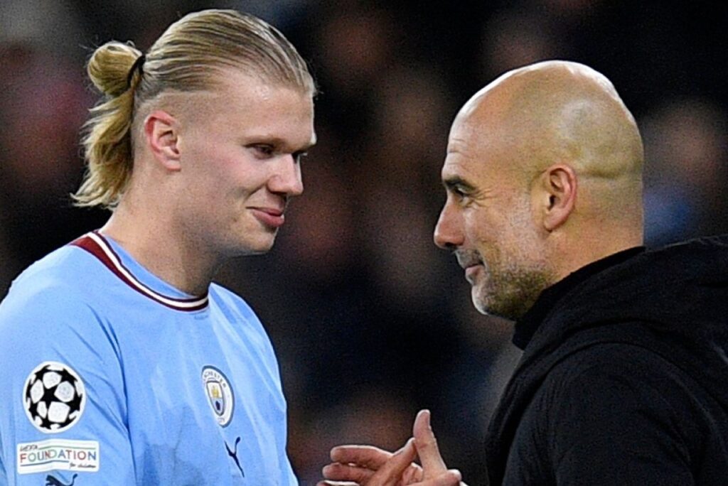 Guardiola frustra PSG e Real: Haaland e Guardiola se cumprimentam após o norueguês ser substituído