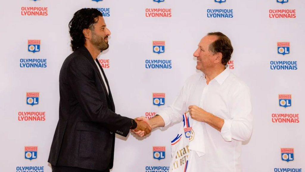 Treinador Fabio Grosso e dono do Lyon, John Textor