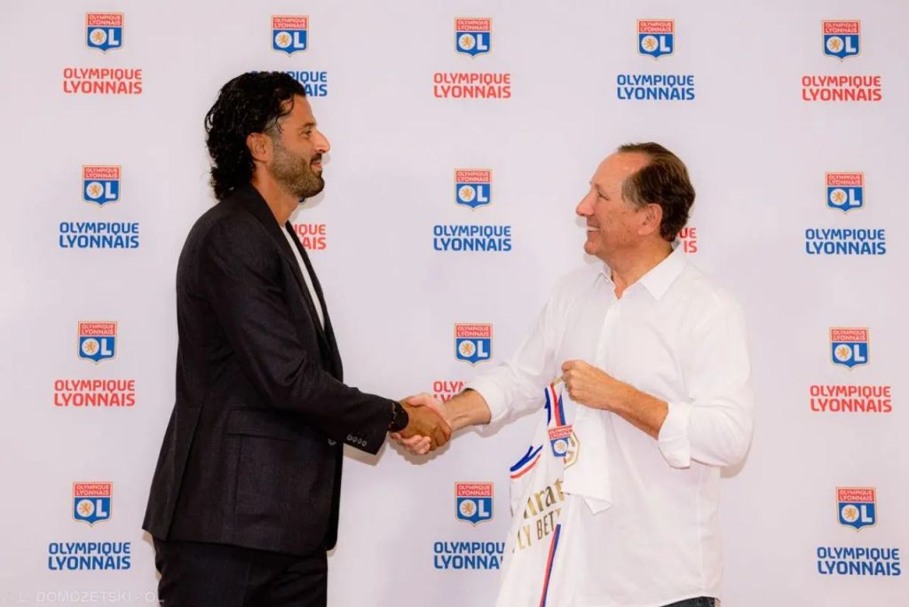 Treinador Fabio Grosso e dono do Lyon, John Textor